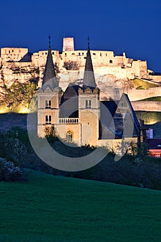 Spissky hrad castle and Spisska Kapitula in the evening